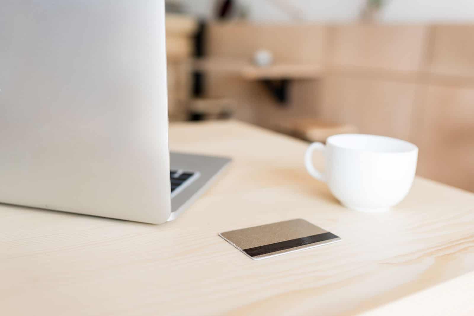 Laptop and coffee mug on desk