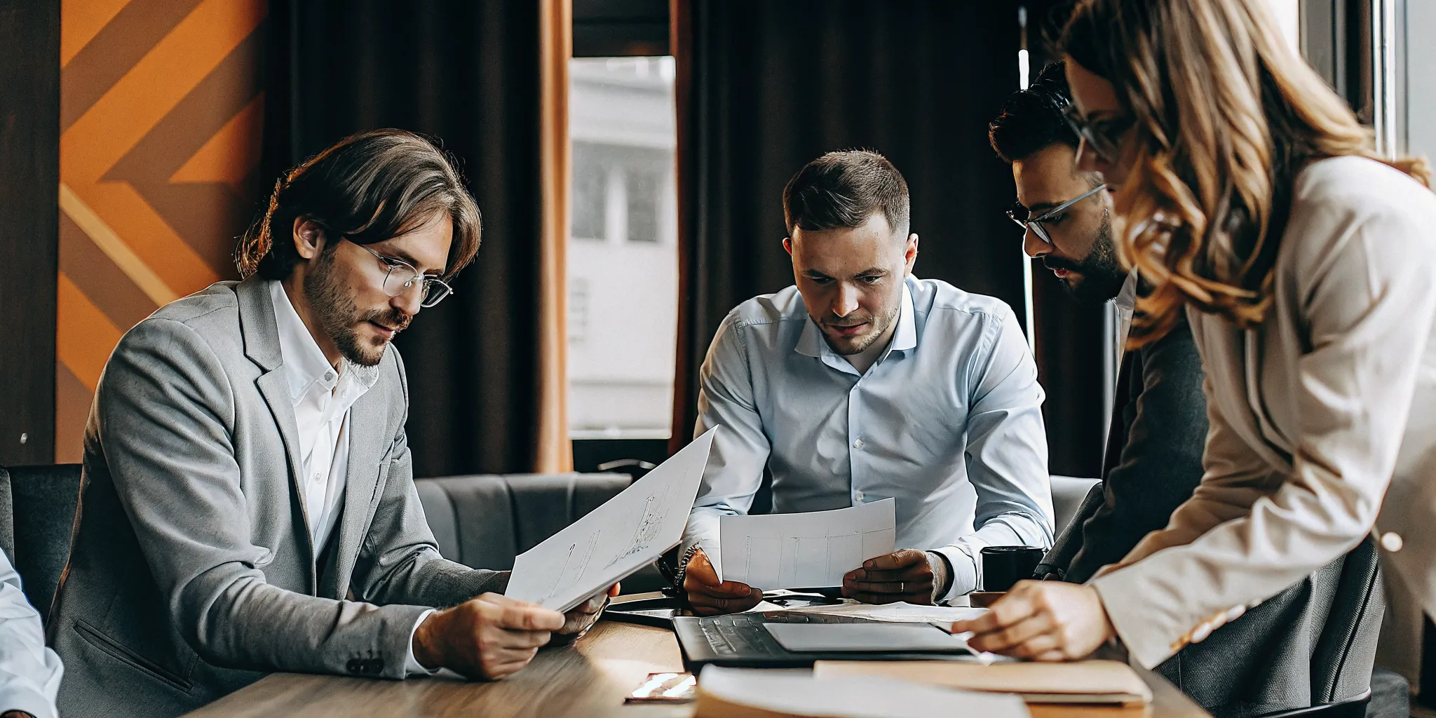 CFO and CEO reviewing eCapital alternatives for B2B invoices